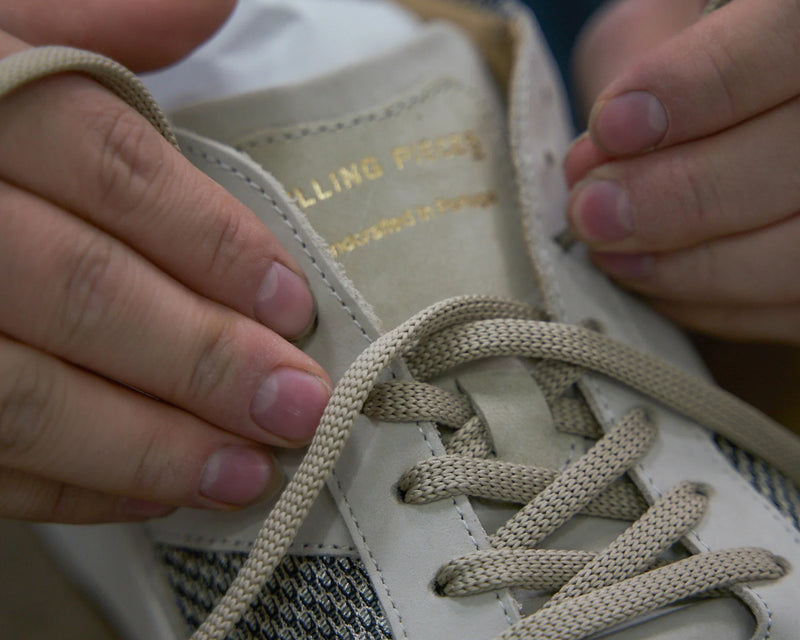 Oeko-Tex certified cotton laces and nylon pull straps.